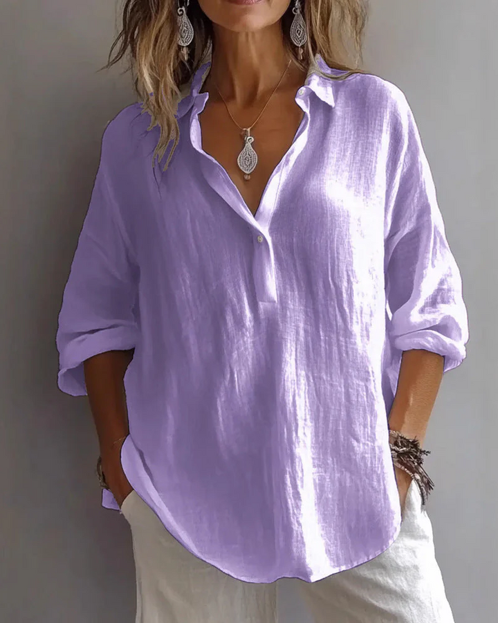 Blusa Holgada con Cuello en V y Mangas Ajustables