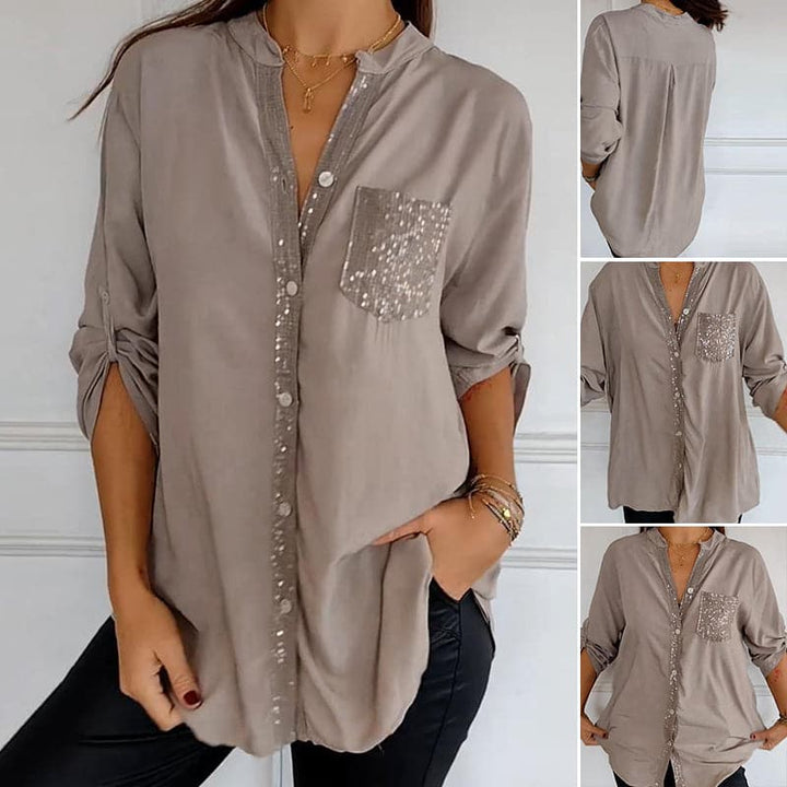Blusa Negra con Detalles Brillantes de Corte Fluido